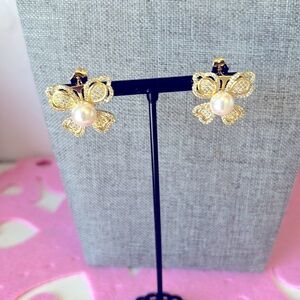 Aretes 14 k gold plated de flor
